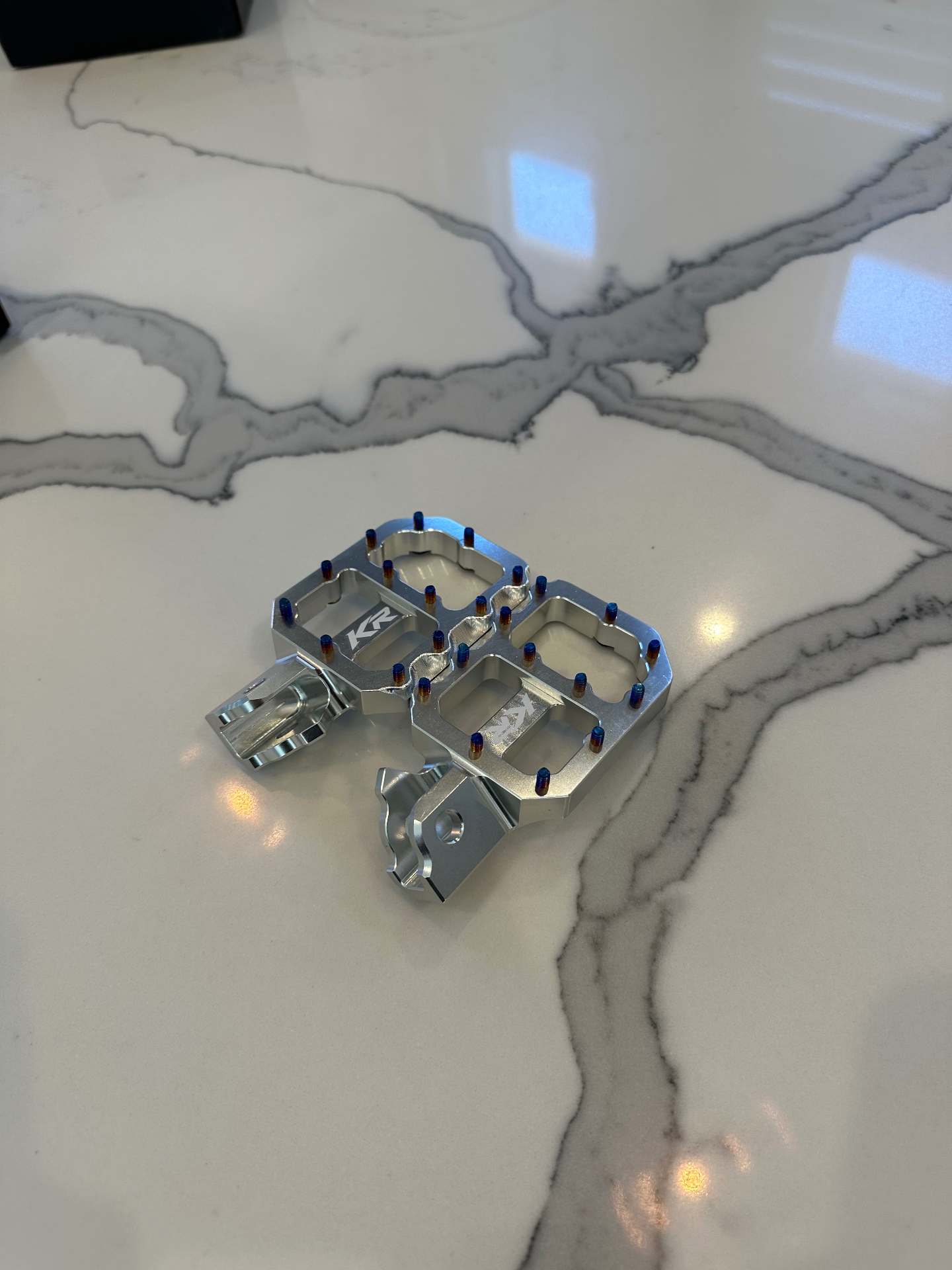 Kinetic Racing chrome emoto pegs on marble